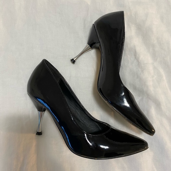 Shiny black pointed toe heels from Call it Spring